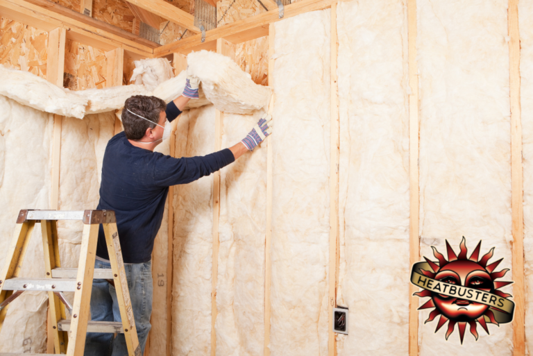 worker-installing-fiberglass-insulation-in-austin